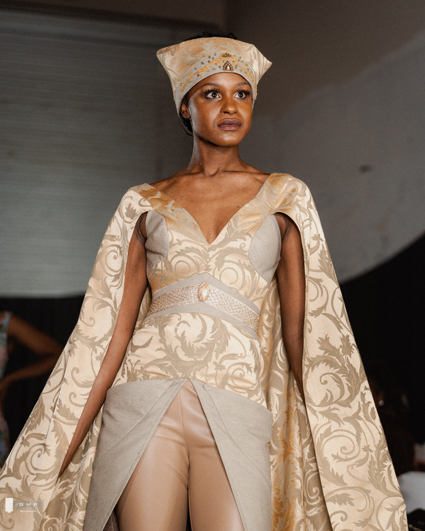 Ivory cape gown, Headpiece and full sweep